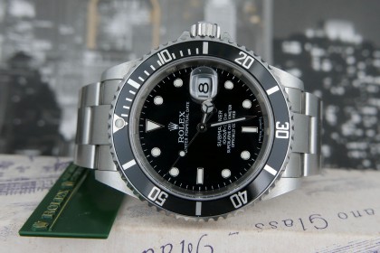 Modern Rolex 16610 Submariner Date complete with Punched papers, inner & outer box etc